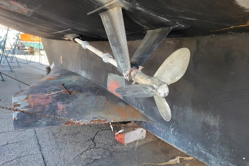 Slide: The Image of Propeller and rudder of 1989 Custom Robb Ladd Pilothouse Cutter, 98 PH Motorsailer. - 14