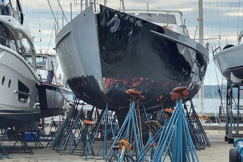 Slide: The Image of Custom 1989 Rob Ladd PH Motorsailer Cutter on stands in a boatyard. - 81