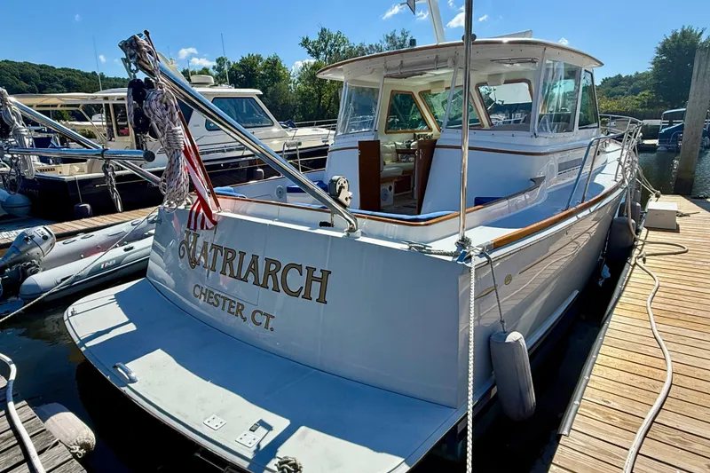 Slide: The Image of Alden 40 Express 1999 docked, featuring "Matriarch" name and Chester, CT location. - 9