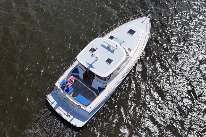 Slide: The Image of Aerial view of 1999 Alden 40 Express yacht cruising on water. - 6