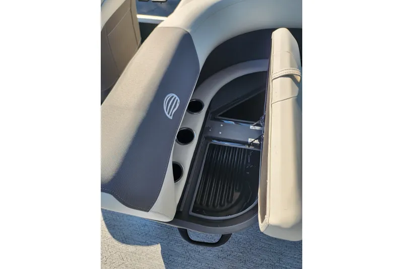 Slide: The Image of 2027 Sun Tracker Bass Buggy 18 DLX boat seat with storage and cup holders. - 13