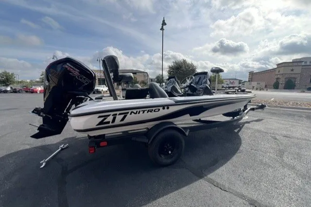 The Image of 2027 Nitro Z17 boat parked outdoors under a cloudy sky. - 0