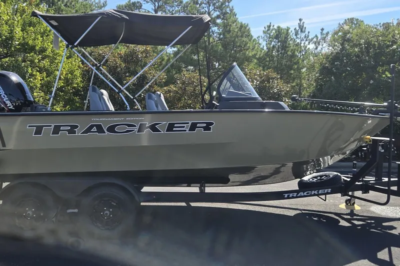 The Image of 2027 Tracker Targa V-19 Combo boat on trailer, parked outdoors. - 0