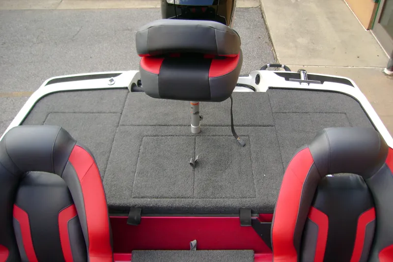 Slide: The Image of Interior of 2027 Nitro Z18 XL Pro boat with red and black seating. - 10