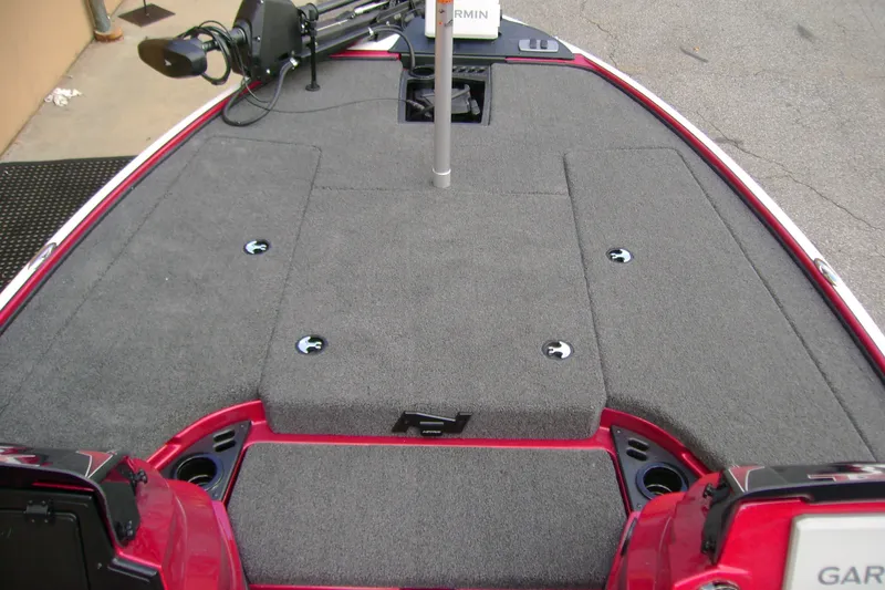 Slide: The Image of 2027 Nitro Z18 XL Pro boat deck with gray carpeting and mounted equipment. - 11