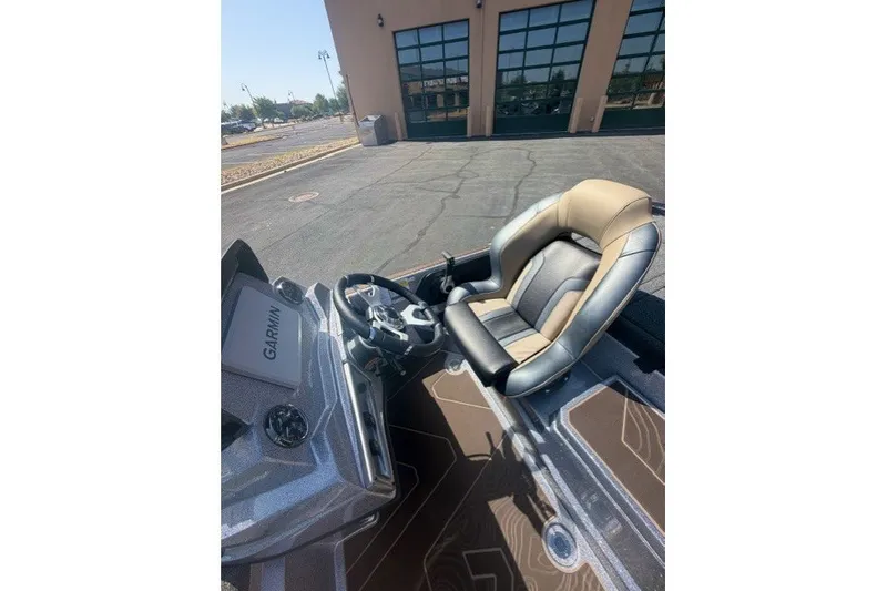 Slide: The Image of 2027 Nitro Z19 XL Pro boat interior with Garmin navigation system and comfortable seating. - 8