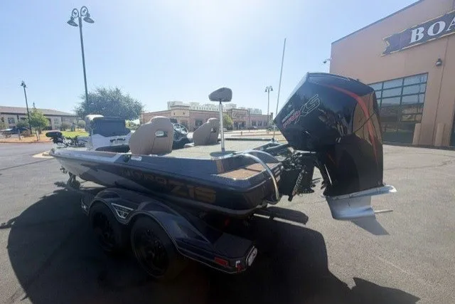 Slide: The Image of 2027 Nitro Z19 XL Pro boat with powerful outboard motor in a sunny outdoor setting. - 4