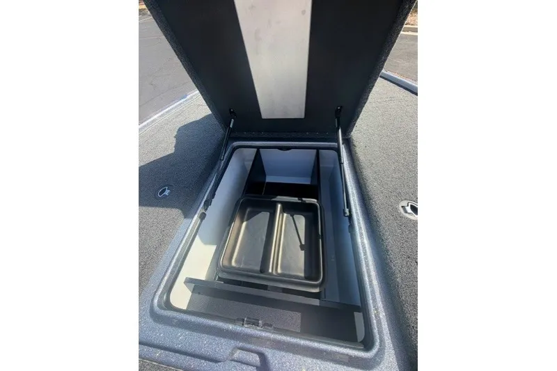Slide: The Image of Open storage compartment of 2027 Nitro Z19 XL Pro boat, showcasing interior design. - 11