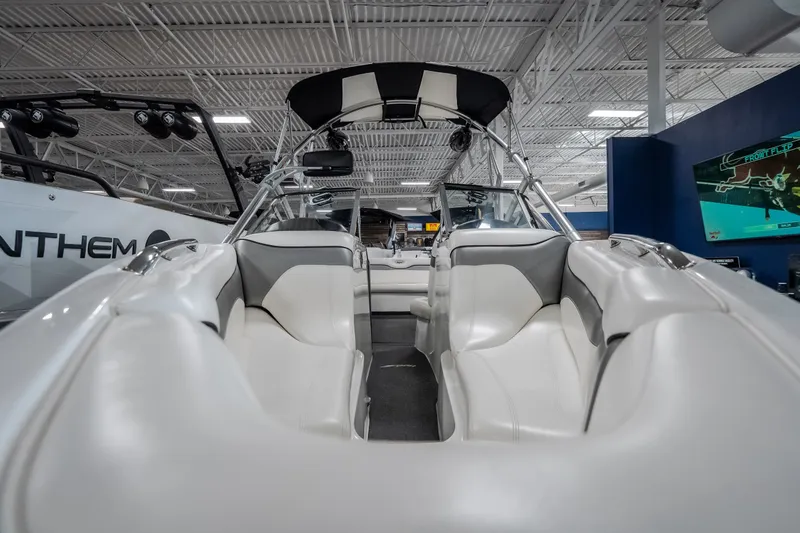 Slide: The Image of 2008 Tigé 24Ve boat interior with white seating and sleek design. - 29