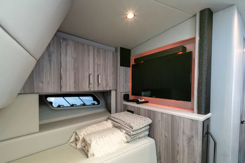 Slide: The Image of Luxurious interior of 2022 Formula 500 Super Sport Crossover with modern cabinetry and entertainment system. - 52