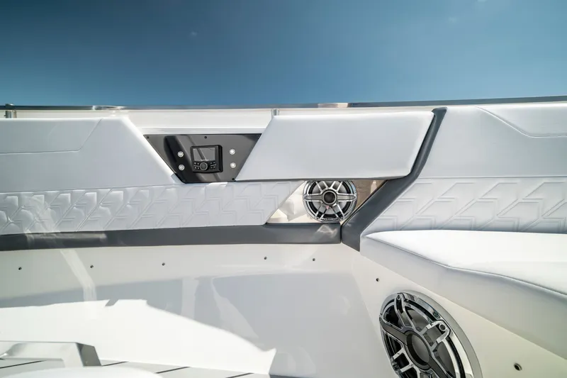 Slide: The Image of Interior view of 2022 Formula 500 Super Sport Crossover boat with speakers and control panel. - 29