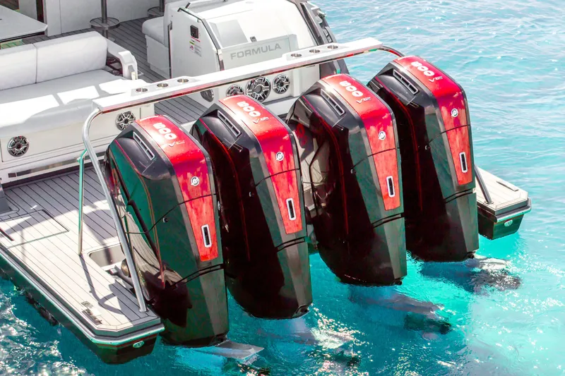 Slide: The Image of 2022 Formula 500 Super Sport Crossover with four powerful outboard engines on clear blue water. - 17