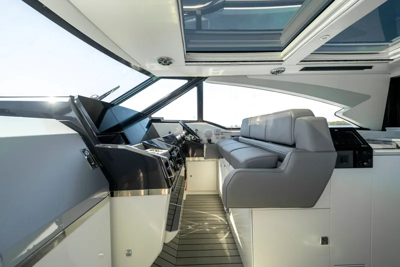 Slide: The Image of Luxurious interior of 2022 Formula 500 Super Sport Crossover yacht with modern helm and seating. - 20