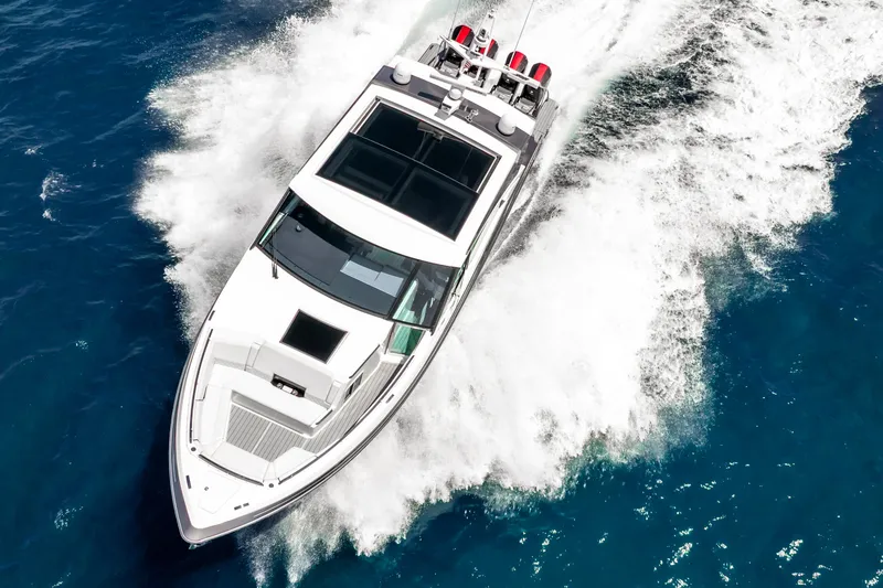 Slide: The Image of 2022 Formula 500 Super Sport Crossover cruising on open blue water. - 9