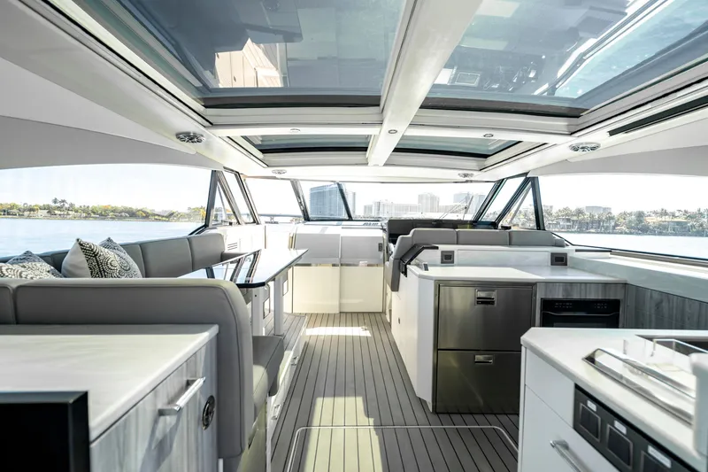 Slide: The Image of Interior of 2022 Formula 500 Super Sport Crossover yacht with modern design and panoramic windows. - 25