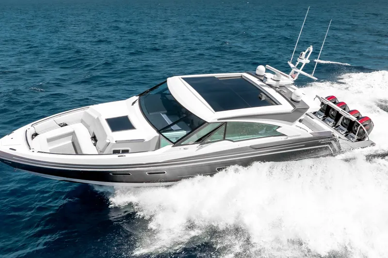 Slide: The Image of 2022 Formula 500 Super Sport Crossover cruising on open blue water. - 3
