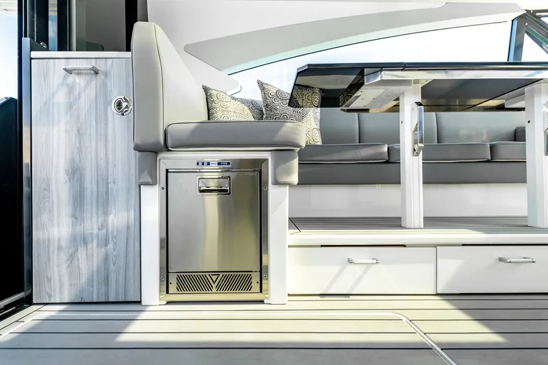 Slide: The Image of Interior of 2022 Formula 500 Super Sport Crossover yacht with modern seating and table. - 33