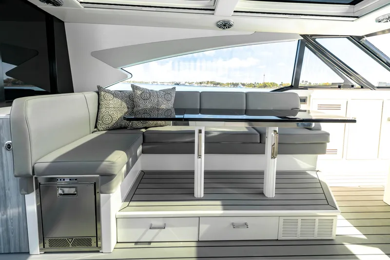 Slide: The Image of Luxurious interior of 2022 Formula 500 Super Sport Crossover yacht with elegant seating and table. - 27
