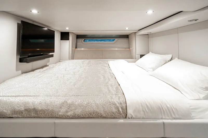 Slide: The Image of Luxurious cabin interior of 2022 Formula 500 Super Sport Crossover with bed and TV. - 60