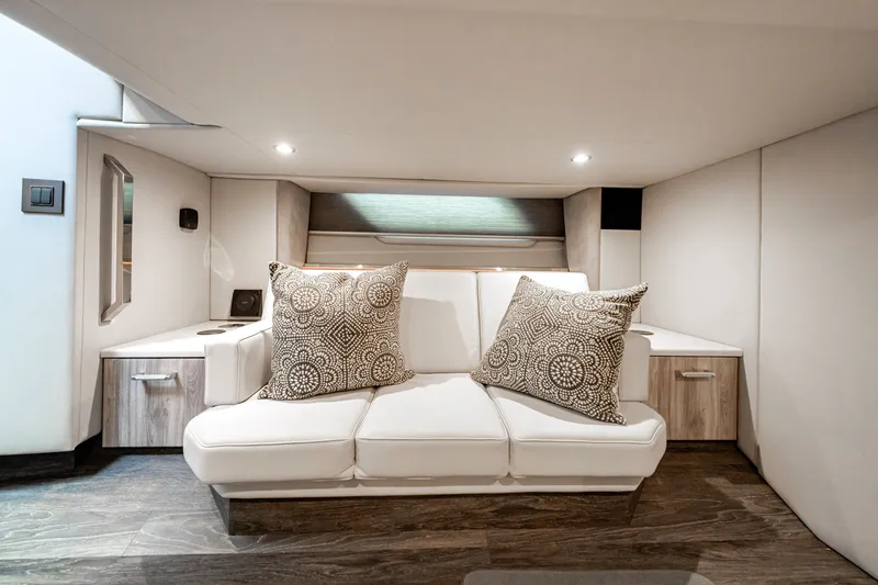 Slide: The Image of Luxurious interior of 2022 Formula 500 Super Sport Crossover with elegant white seating and patterned cushions. - 61