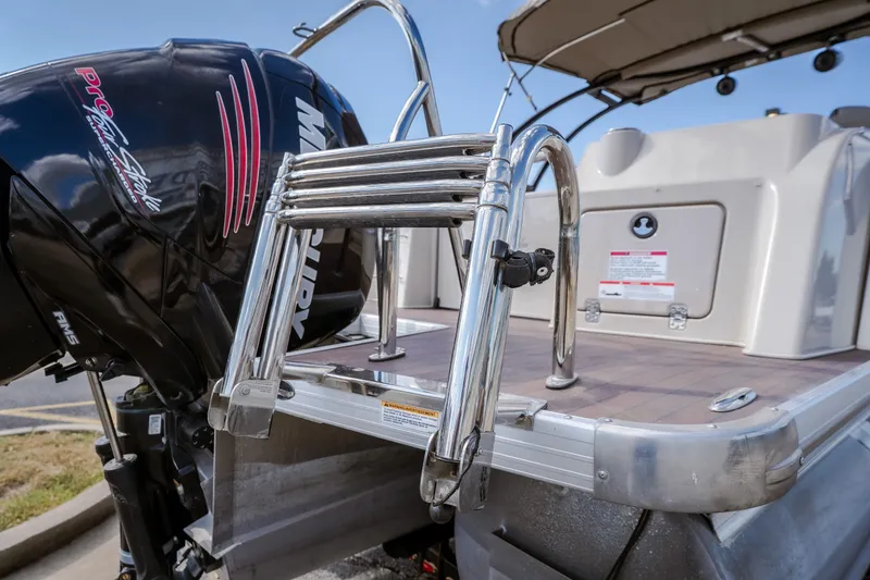 Slide: The Image of 2017 Princecraft Vogue 25 XT boat with Mercury engine and stainless steel ladder. - 3