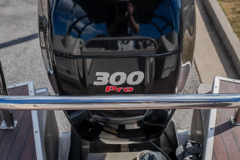 Slide: The Image of Outboard motor on 2017 Princecraft Vogue 25 XT boat, featuring "300 Pro" branding. - 33