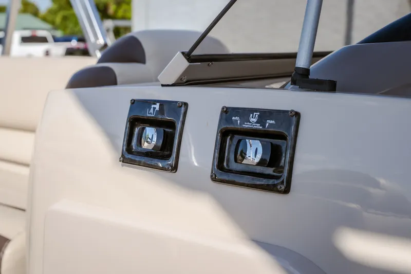 Slide: The Image of 2017 Princecraft Vogue 25 XT boat dashboard with control switches. - 25