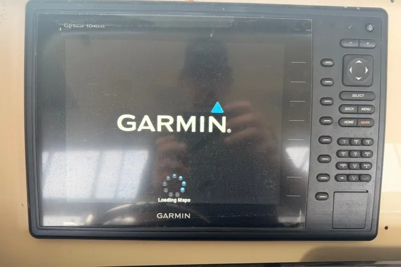 Slide: The Image of Garmin GPSMAP 1040xs display on 2014 Scout 275 LXF boat, loading maps. - 7
