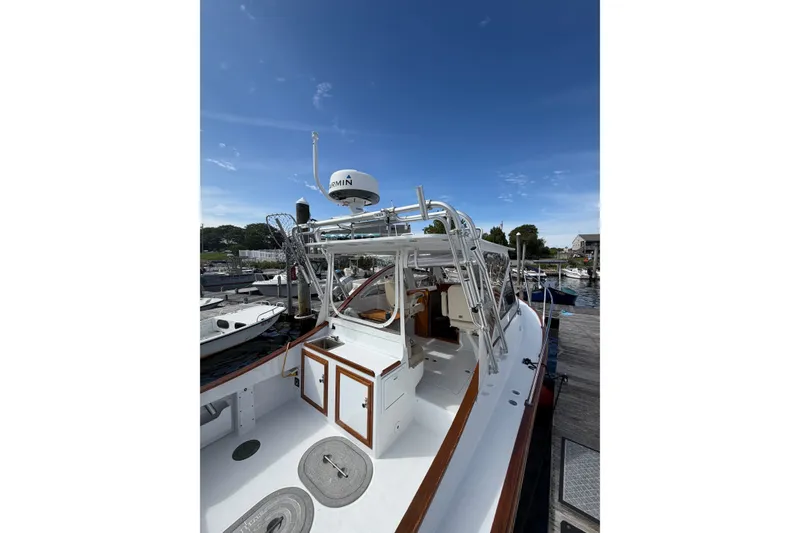 Slide: The Image of 2000 Webber's Cove Pemaquid Beach boat docked under clear blue sky. - 15