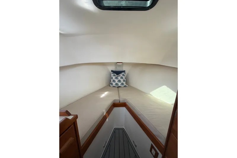 Slide: The Image of Cozy cabin interior of 2000 Webber's Cove Pemaquid Beach boat with cushions and skylight. - 24