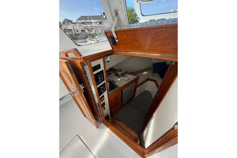 Slide: The Image of Interior view of 2000 Webber's Cove Pemaquid Beach boat cabin with wood finish. - 21