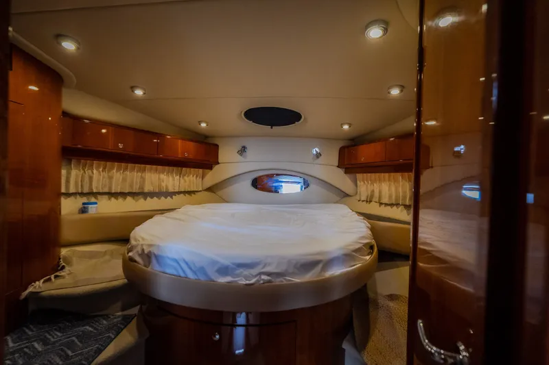 Slide: The Image of Luxurious cabin interior of 2009 Regal Commodore 4460 yacht with elegant wood finishes. - 46