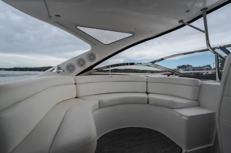 Slide: The Image of Luxurious interior of 2009 Regal Commodore 4460 yacht with plush seating and scenic view. - 18