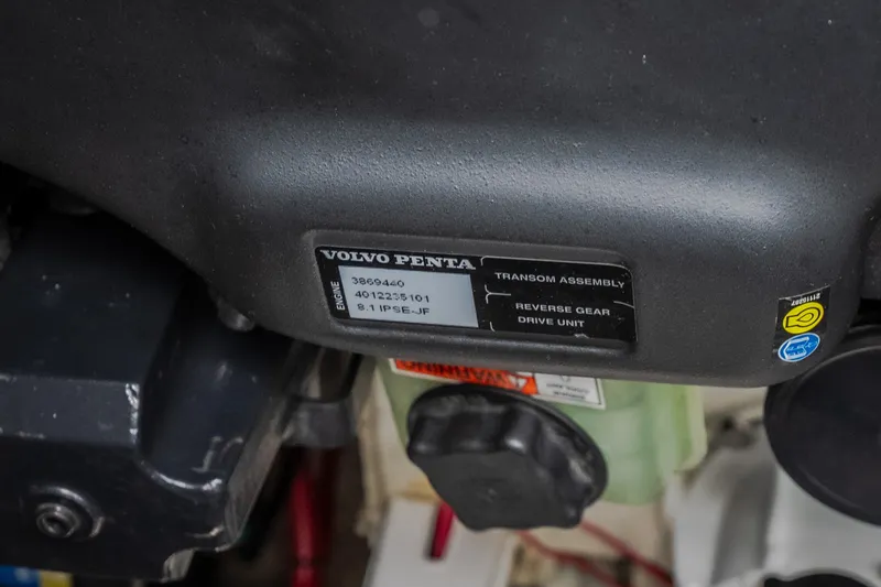 Slide: The Image of Volvo Penta engine label on 2009 Regal Commodore 4460 boat, showing transom assembly details. - 58