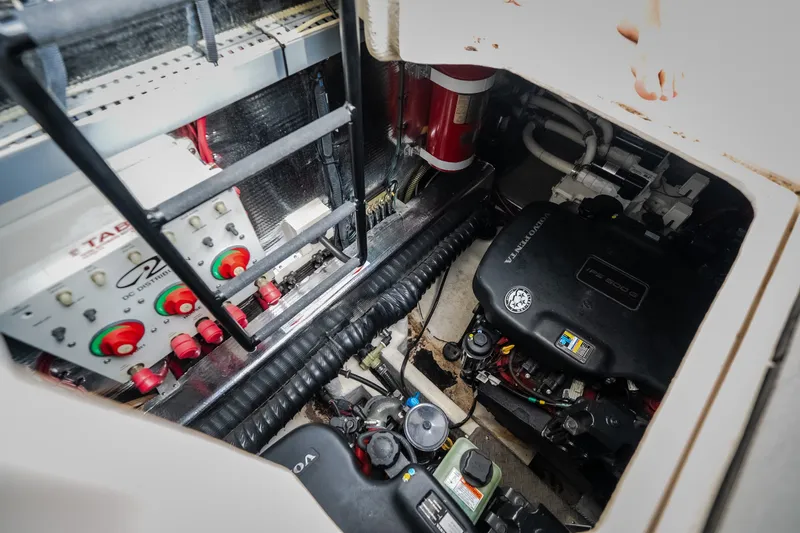 Slide: The Image of Engine compartment of 2009 Regal Commodore 4460 yacht with Volvo Penta components. - 60