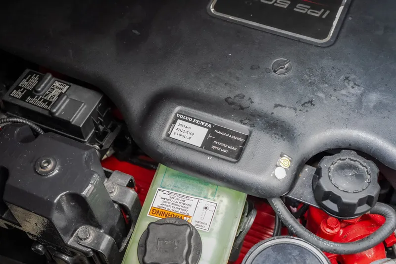 Slide: The Image of Engine compartment of a 2009 Regal Commodore 4460 with Volvo Penta components. - 56