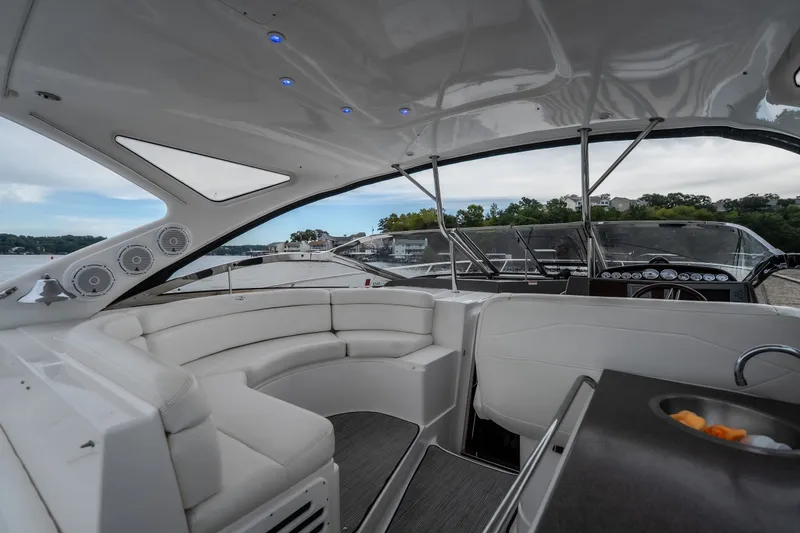 Slide: The Image of Luxurious interior of 2009 Regal Commodore 4460 yacht with plush seating and modern design. - 14
