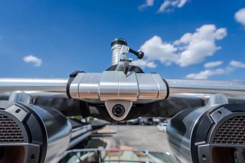 Slide: The Image of 2020 MasterCraft X26 boat tower with speakers and camera under a blue sky. - 22
