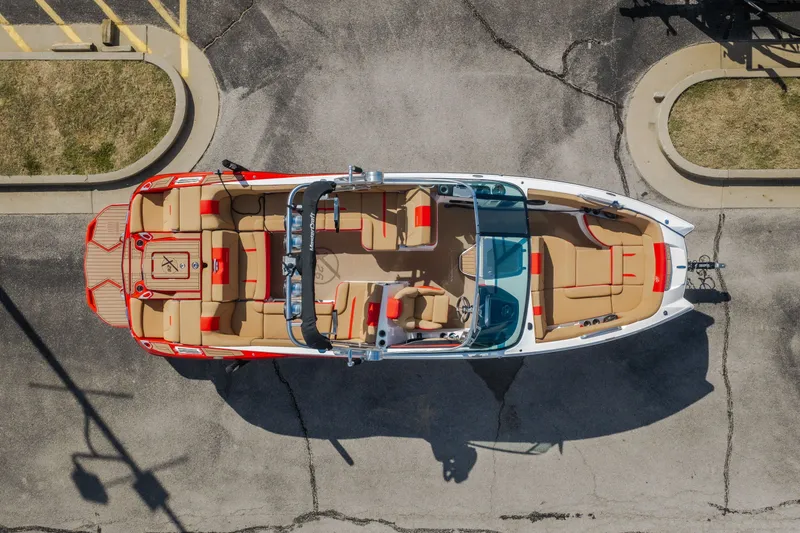 Slide: The Image of Aerial view of 2020 MasterCraft X26 boat with beige and red seating. - 60