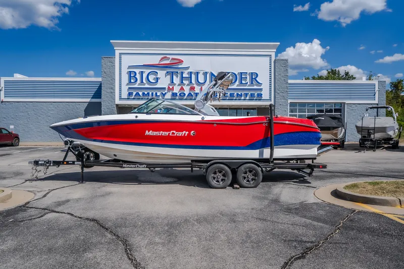 The Image of 2020 MasterCraft X26 boat on trailer at Big Thunder Marine dealership. - 1