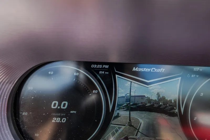 Slide: The Image of Dashboard of a 2020 MasterCraft X26 boat displaying speed and camera view. - 37