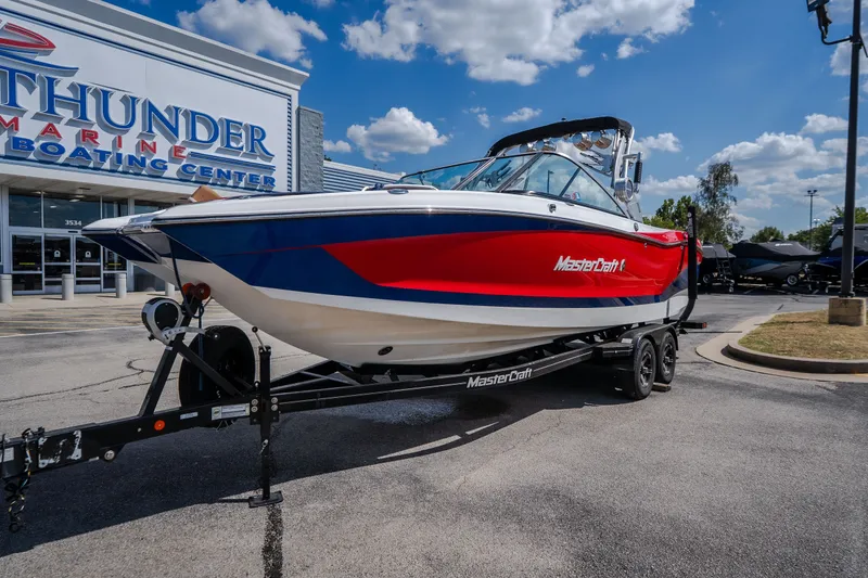 Slide: The Image of 2020 MasterCraft X26 boat on trailer at Thunder Marine Boating Center. - 3