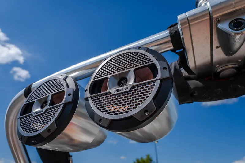 Slide: The Image of Close-up of Klipsch speakers on a 2020 MasterCraft X26 boat against a clear blue sky. - 21