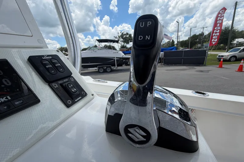 Slide: The Image of Control panel of 2021 Dusky 227 Open Fisherman boat with Suzuki throttle. - 27