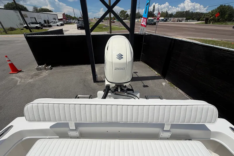 Slide: The Image of 2021 Dusky 227 Open Fisherman boat with Suzuki 200 engine, parked outdoors. - 60