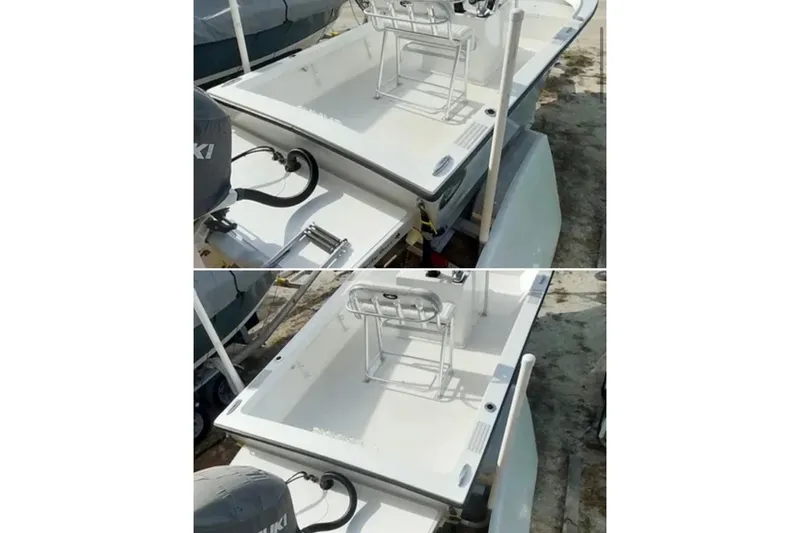 Slide: The Image of 2021 Dusky 227 Open Fisherman boat with Suzuki outboard engine, docked outdoors. - 6