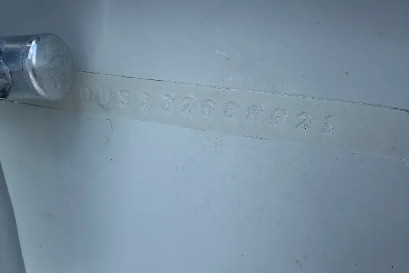 Slide: The Image of Hull identification number on a 2021 Dusky 227 Open Fisherman boat. - 63