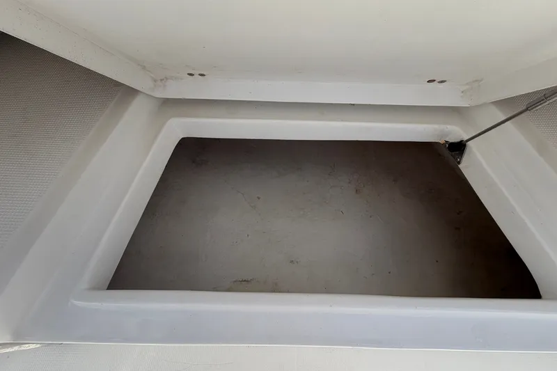 Slide: The Image of Storage compartment in the boat with hydraulic support. - 36