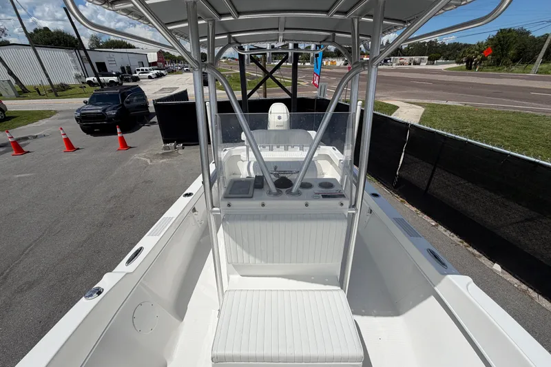 Slide: The Image of 2021 Dusky 227 Open Fisherman boat interior with console and seating. - 48