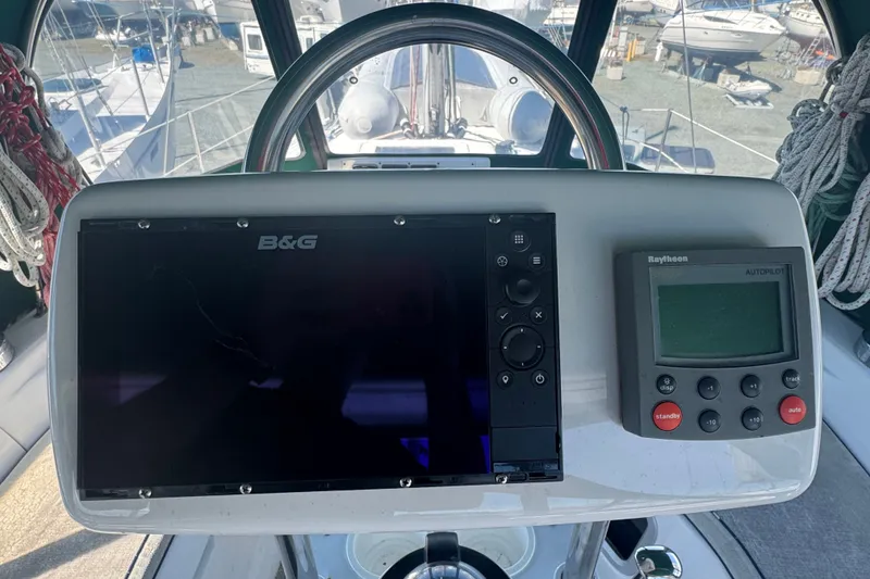 Slide: The Image of Cockpit of 1999 Hunter 420 sailboat with B&G navigation and Raytheon autopilot systems. - 3
